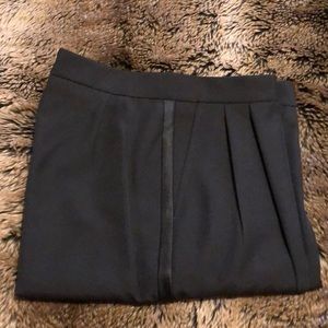Women’s black pleated tuxedo pants, size 12.